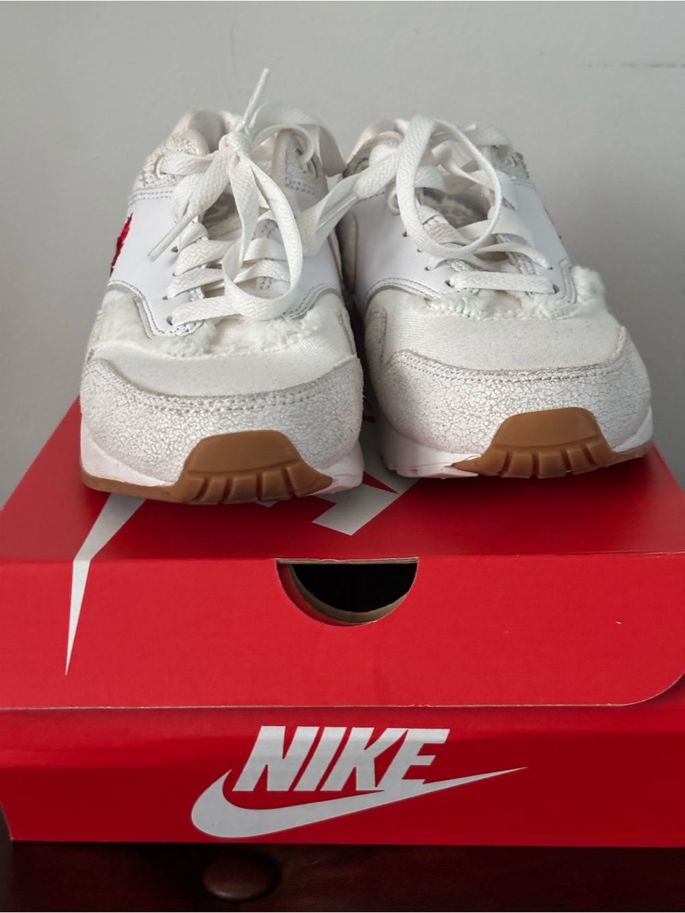 Nike Kids White Sneakers with Gum Outsole and Red Swoosh
